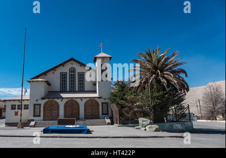 Chuquicamata town, once a thriving company town with banks, restaurants and playgrounds, but which has since been evacuated due to legal and health is Stock Photo