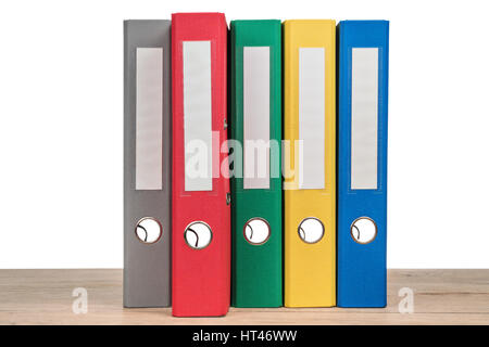 Multi-colored office folders to store documents standing next to each other, close-up Stock Photo