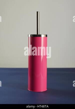 Pink plastic toilet brush with metal handle Stock Photo