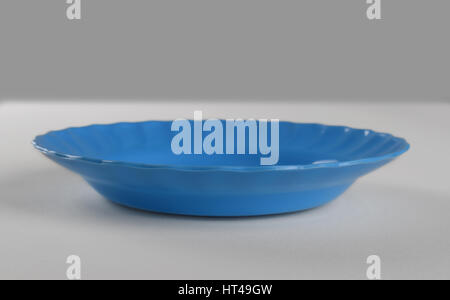 Blue plastic shallow dish food Stock Photo - Alamy