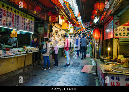 TAIPEI, TAIWAN - DECEMBER 19: This is the main market street in Jiufen town with crowds of people and many street food vendors on December 19, 2016 in Stock Photo