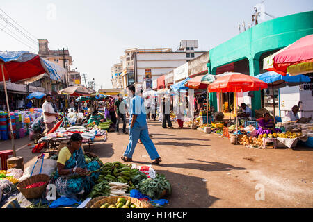 Farmers selling their goods at the Mapusa Market in North Goa, India. People from the surrounding come to Mapusa to sell their wares. Unlike other tou Stock Photo