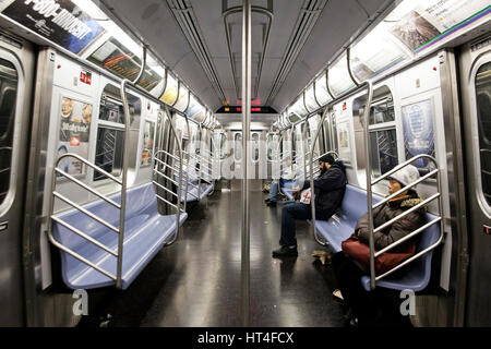 Passengers inside the New York City Subway, United States of America.