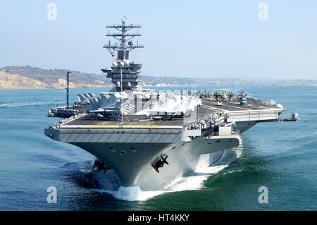 The USN Nimitz-class aircraft carrier USS Nimitz departs the Naval Base San Diego July 31, 2009 in San Diego, California. Stock Photo