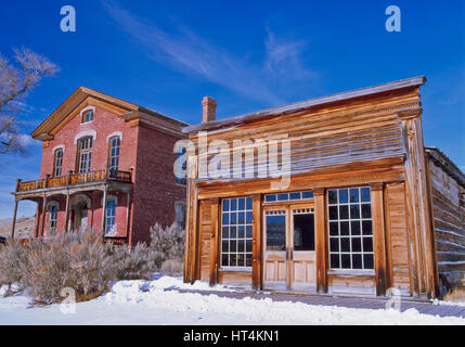 ghost town buildings in winter at bannack state park, montana Stock Photo