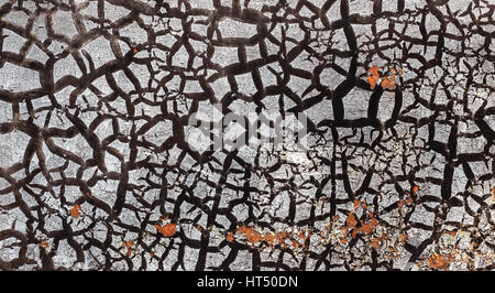 Abstract texture of metal wall with cracked paint and rust traces Stock Photo