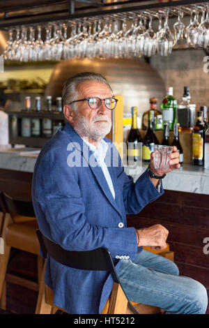 Senior Man Hangout Drinking Alcohol Night Club Concept Stock Photo