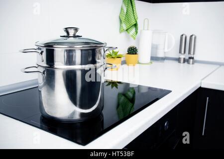 Electric Cooking Pot In The Kitchen Stock Photo, Picture and Royalty Free  Image. Image 18308328.