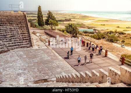 LIMASSOL, CYPRUS - March 28, 2016: Tourists visiting the Kourion's Greco-Roman theatre. Stock Photo