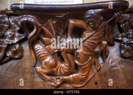 Misericords of the medieval Wells Cathedral built in the Early English Gothic style in 1175, Wells Somerset, England Stock Photo