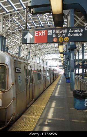 NY subway F train at Stillwell Avenue/Surf Avenue, Coney Island, NYC, USA Stock Photo