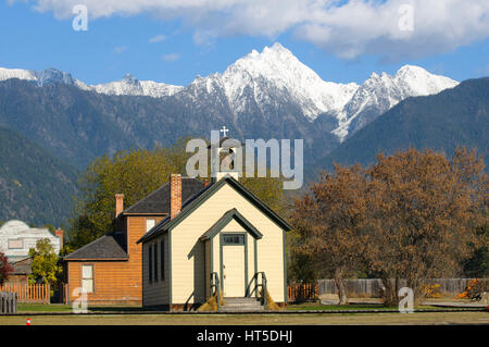 Anglican Church, with Rocky Mountain vista, Fort Steele Heritage Town,  Kootenay Region, British Columbia, Canada Stock Photo