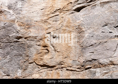 Granite stone texture background with rich detail in browns and grays. Stock Photo