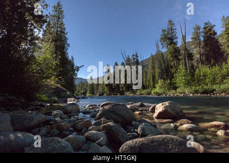 Flowing river through the Sierra Nevada mountains at night along the Pacific Crest Trail. Stock Photo