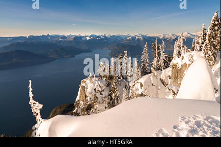 Howe Sound Aerial Landscape Distant Snowy British Columbia Coast Mountains. White Snow Blue Water Scenic St. Marks Lookout Skyline View Stock Photo