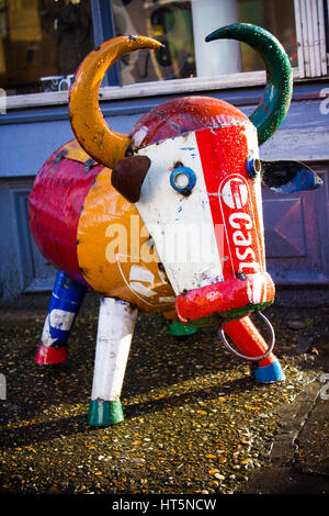 Striking 'steam punk' bull holds its ground alongside Camden Road, London. Stock Photo