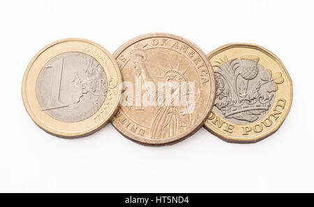 Three of the world's biggest trading currencies, the american dollar, the european euro, and the british sterling pound. Stock Photo