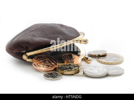 Loose change with an open purse. British coins including the new pound coin introduced in 2017. Stock Photo