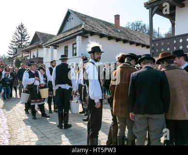 Men preparing for the Hungarian Easter Monday tradition of throwing water at girls Stock Photo