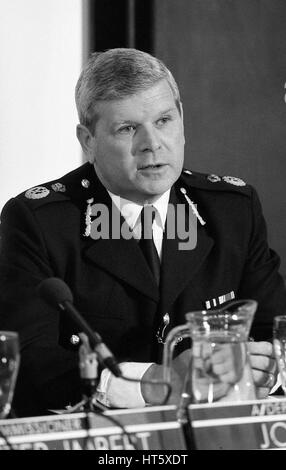 John Smith, Assistant Deputy Commissioner of the Metropolitan Police Force attends a press conference at New Scotland Yard in London, England on May 23, 1990. Stock Photo