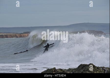 Surfing at Freshwater Bay Isle of Wight Stock Photo