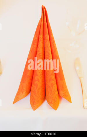 Orange paper napkin Stock Photo