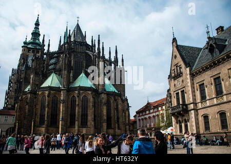 Czech Republic Prague 11.04.2014: People in front of the Old Saint Vitus Cathedral on a sunny day Stock Photo