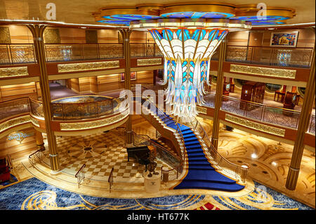 Orlando, USA - August 24, 2014: Main lobby in disney cruise ship. Empty staircase on Disney Dream cruise ship Stock Photo