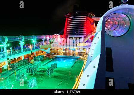 Orlando, USA - August 24, 2014: Aquaduck slide on open deck of cruise ship at night time. Empty open deck od cruise line ship Stock Photo