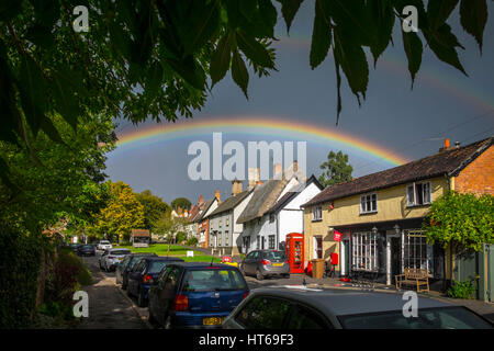 Double rainbow over Hoxne, Suffolk, UK. Stock Photo