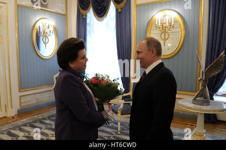 Russian President Vladimir Putin congratulates cosmonaut Valentina Tereshkova, on her 80th birthday at the Kremlin March 6, 2017 in Moscow, Russia. Tereshkova was the first woman in space aboard the Vostok 6 on June 16, 1963. Stock Photo