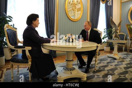 Russian President Vladimir Putin congratulates cosmonaut Valentina Tereshkova, on her 80th birthday at the Kremlin March 6, 2017 in Moscow, Russia. Tereshkova was the first woman in space aboard the Vostok 6 on June 16, 1963. Stock Photo