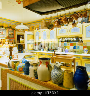 Retro style yellow kitchen. Stock Photo