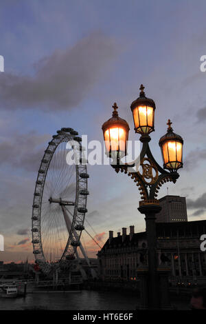 Summer sunset, London Eye or Millennium Observation Wheel opened in 1999, South Bank, river Thames, Lambeth, London City, England Stock Photo