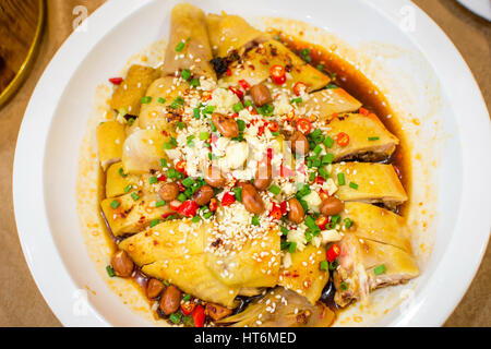 Chinese chicken salad with various ingredients on a plate Stock Photo