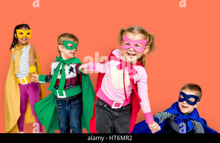 Little Kids Dressing Superhero Hold Hands Stock Photo