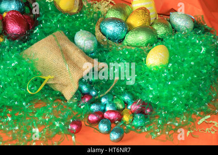 An image showing the concept of Easter with a selection of colorful eggs Stock Photo