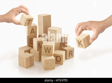 Teamwork & collaboration concept on isolated background. Stock Photo