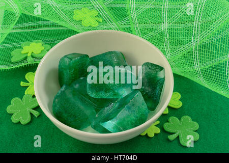 Green ice cubes with green shamrocks for Saint Patrick's Day Stock Photo