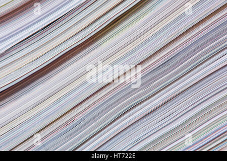Abstract newspaper background made from a stock of magazines
