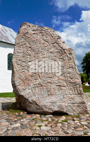 Jelling, Denmark. The figure of Christ on the large Jelling rune stone  raised by King Harald Bluetooth in the 960s. Other side of runic text. Stock Photo