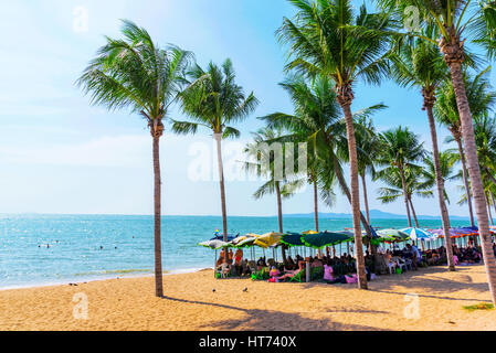 PATTAYA, THAILAND - JANUARY 24: This is a view of Jomtien beach a popular tourist beach in Pattaya where many travellers come to sunbath on January 24 Stock Photo