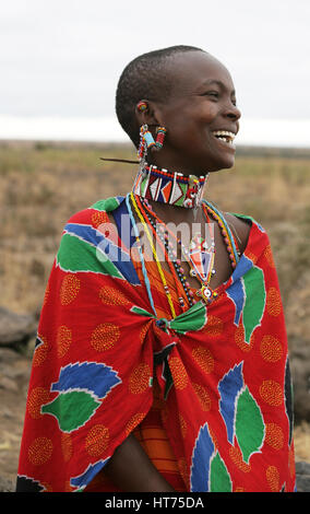 Masai married woman wearing traditional colourful beadwork. 'Laughter'. Kenya Stock Photo