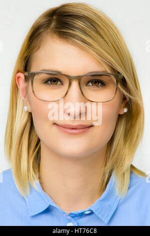 Portrait of a young woman with glasses Stock Photo