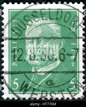 GERMANY - CIRCA 1928: A stamp printed in Germany (Deutsches Reich), shows a portrait of the President of the German Reich Paul von Hindenburg, circa 1 Stock Photo