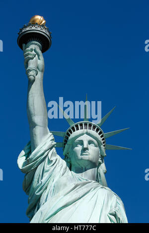 Statue of Liberty, blue sky in a sunny day Stock Photo