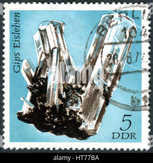 GERMANY - CIRCA 1972: A stamp printed in Germany (GDR), shows the minerals found in East Germany: Gypsum, Eisleben, circa 1972 Stock Photo