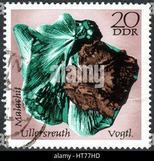 GERMANY - CIRCA 1972: A stamp printed in Germany (GDR), shows the minerals found in East Germany: Malachite, Ullersreuth, circa 1972 Stock Photo