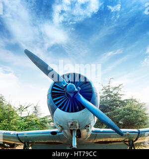 Abandoned old fighter airplane on the ground Stock Photo