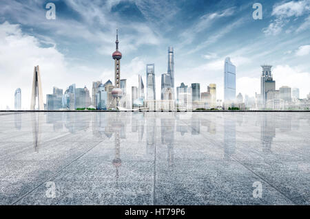 empty marble floor with cityscape and skyline in cloud sky,Shanghai, China. Stock Photo